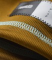 cycling-neck-warmer-merino-brown-element-detail-pedaled.jpeg