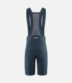 women-cycling-bibshort-navy-element-back-pedaled.webp