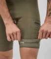men-cycling-cargo-bibshort-military-green-odyssey-elastic-pedaled.webp