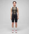 women-cycling-cargo-bibshort-black-odyssey-total-body-front-pedaled.webp