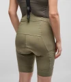 women-cycling-cargo-bibshort-military-green-odyssey-back-pedaled.webp