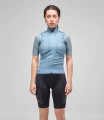 women-cycling-insulated-vest-light-blue-odyssey-total-body-front-pedaled.webp