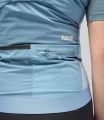 women-cycling-insulated-vest-light-blue-odyssey-back-pocket-pedaled.jpg