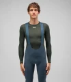 27WBLOD40PE_02_men-cycling-base-layer-long-sleeve-dark-olive-odyssey-total-body-front-pedaled.webp