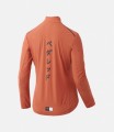 women-water-resistant-cycling-jacket-brick-red-back-mirai-pedaled.jpg